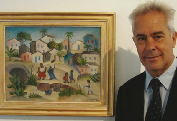 Oscar Smoljan, director MNBA Neuquén y la obra Pueblito, 1945, de Tarsila do Amaral